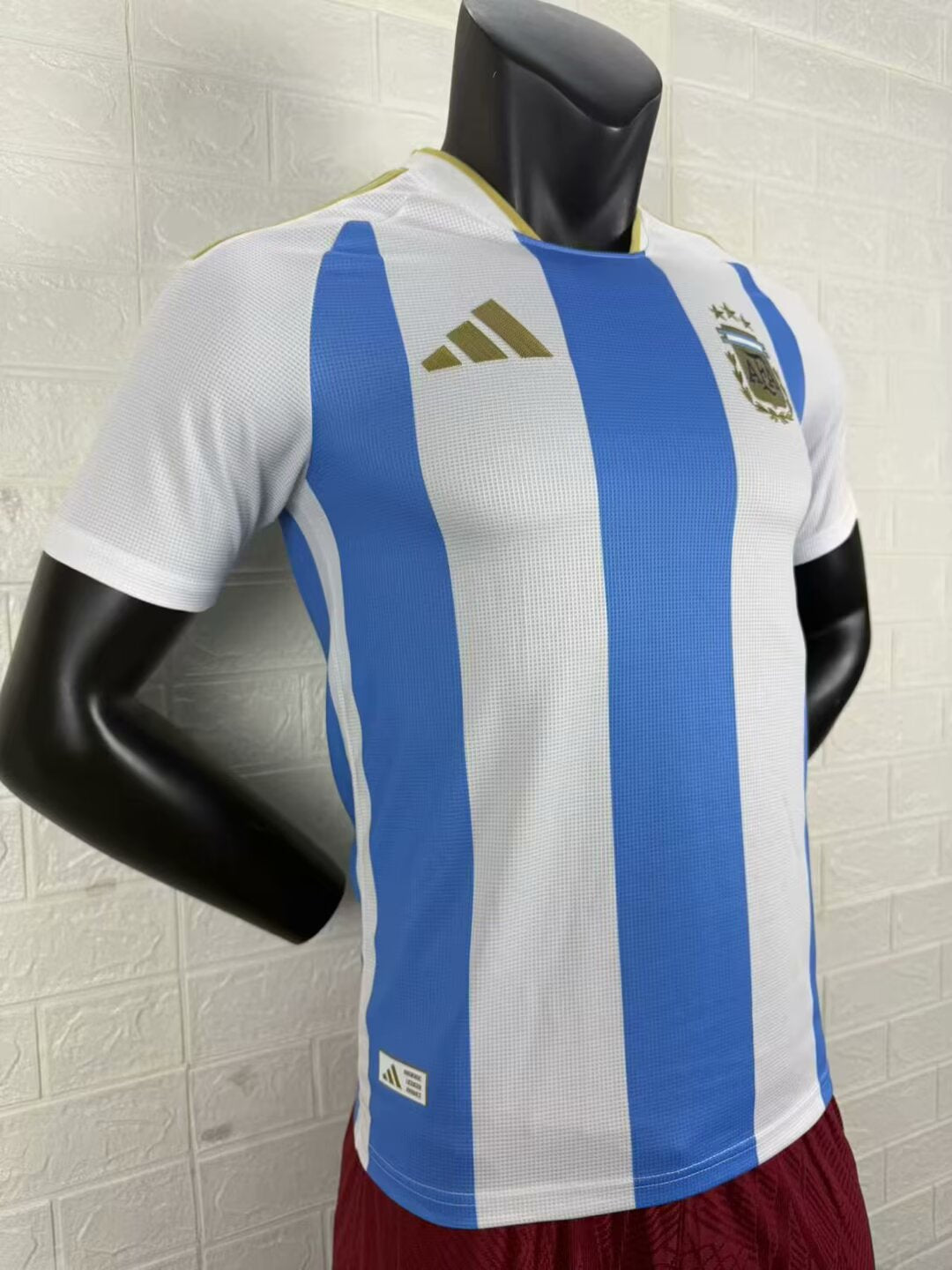 2025/26 Argentina Home Player Version Jersey - White Body Wide Sky Blue Central Vertical Stripe Fine Grid Texture Three Gold Stars Gold Collar Trim - Gold Three Stripes - AFA Square Crest
