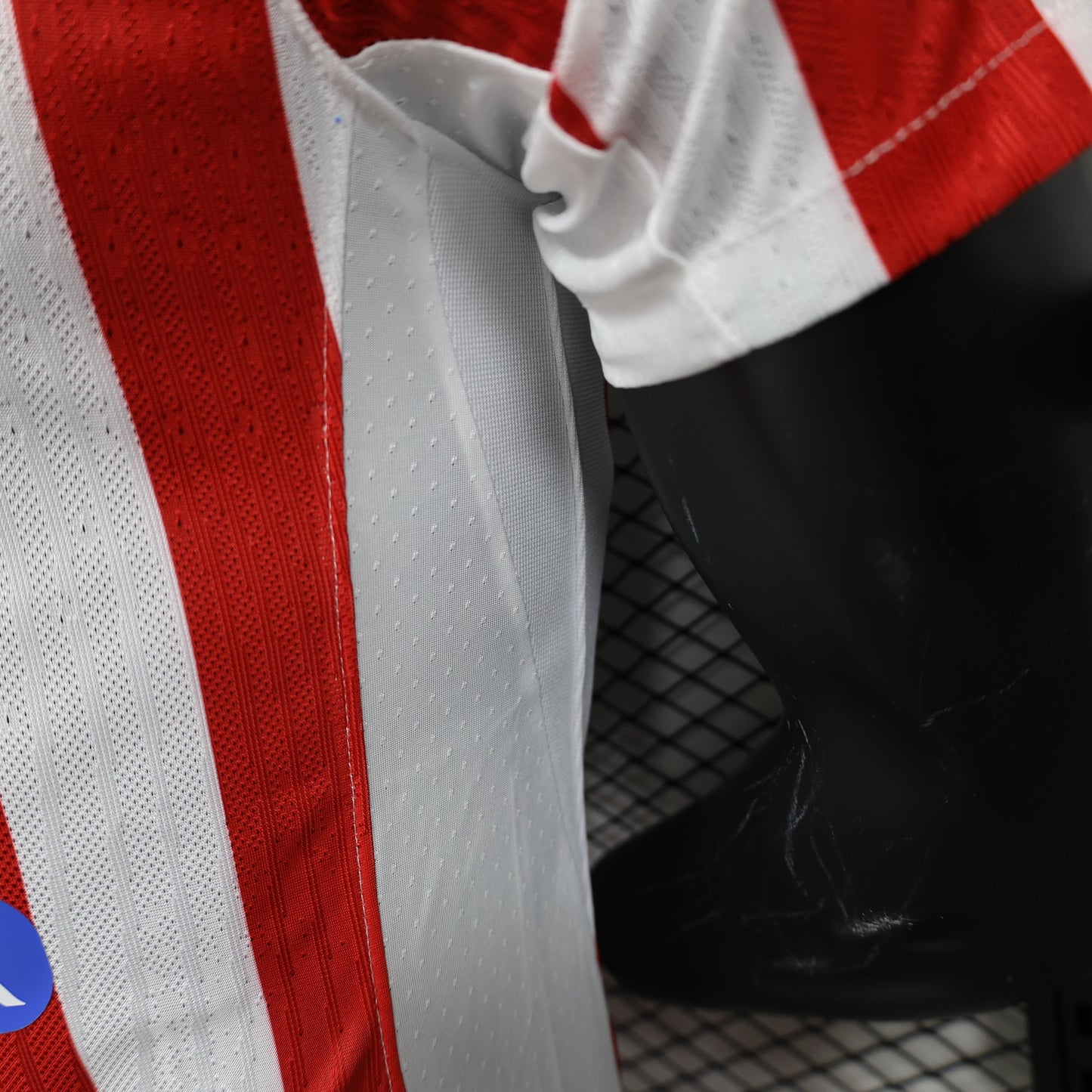 2025/26 Atlético de Madrid Home Player Version Jersey -  Red & White Vertical Wide Stripe - White V-Neck Collar - Blue Nike Swoosh - Atlético Crest - Riyadh Air Blue Sponsor