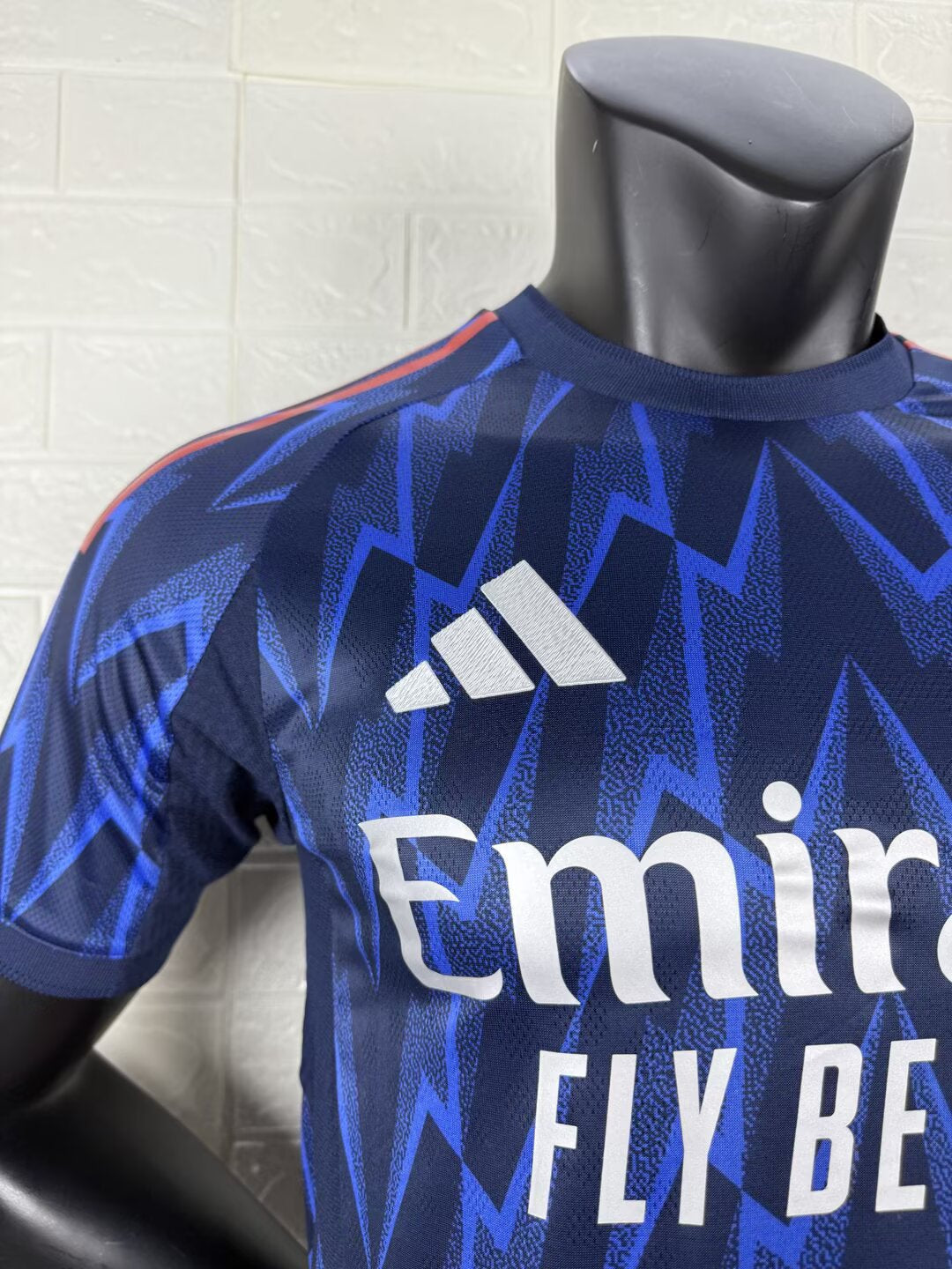 2025/26 Arsenal Away Player Version Jersey - Dark Navy Blue Body All-Over Blue Lightning Bolt Zigzag Graphic - White Three Stripes - Arsenal Cannon Crest - Emirates Fly Better Principal Sponsor