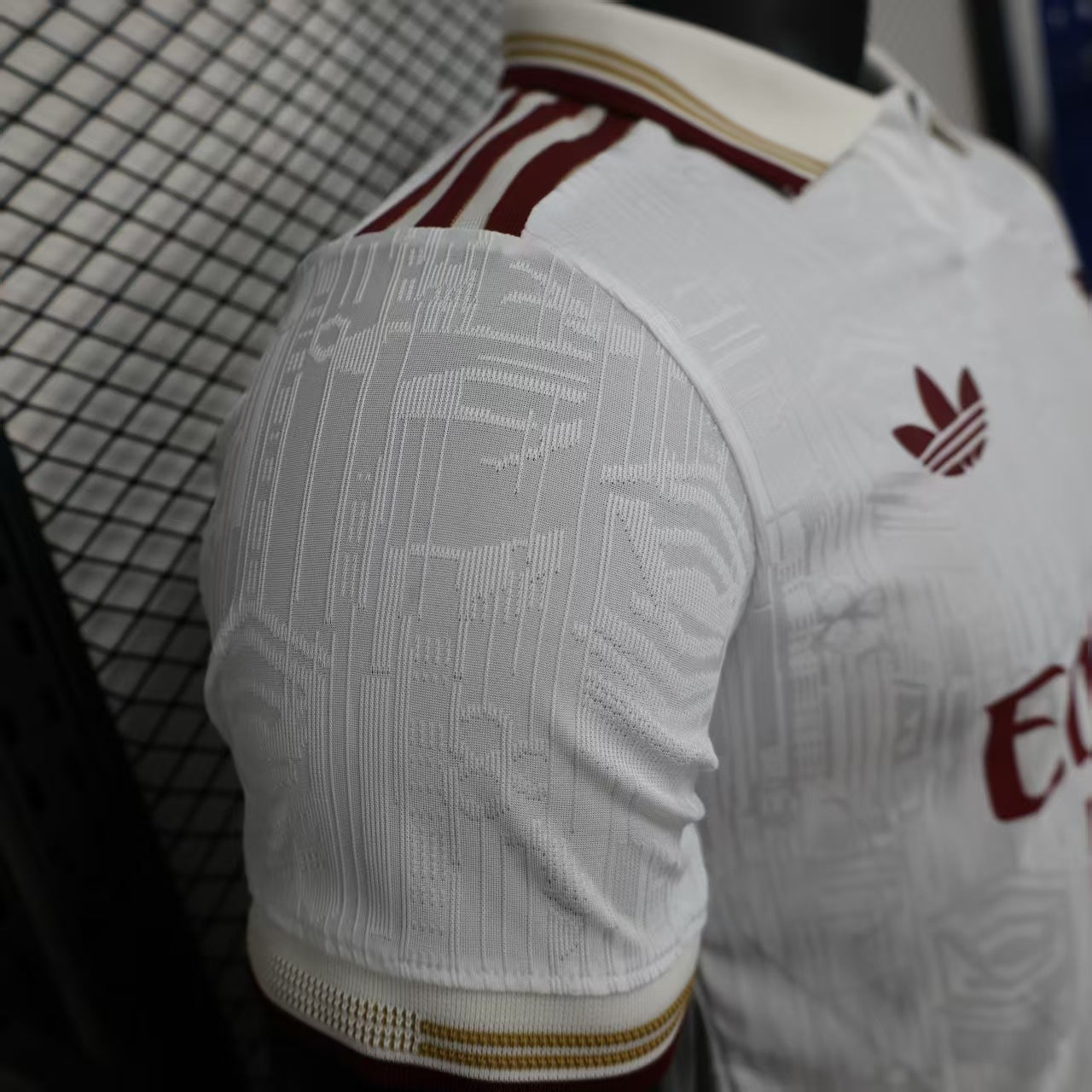 2025/26 Arsenal Away Player Version Jersey - White Body All-Over Subtle Tonal Graphic Texture Deep Maroon Polo Collar Gold Cream Stripe Trim - Originals Trefoil - Arsenal Cannon Crest - Emirates Fly Better - Men's