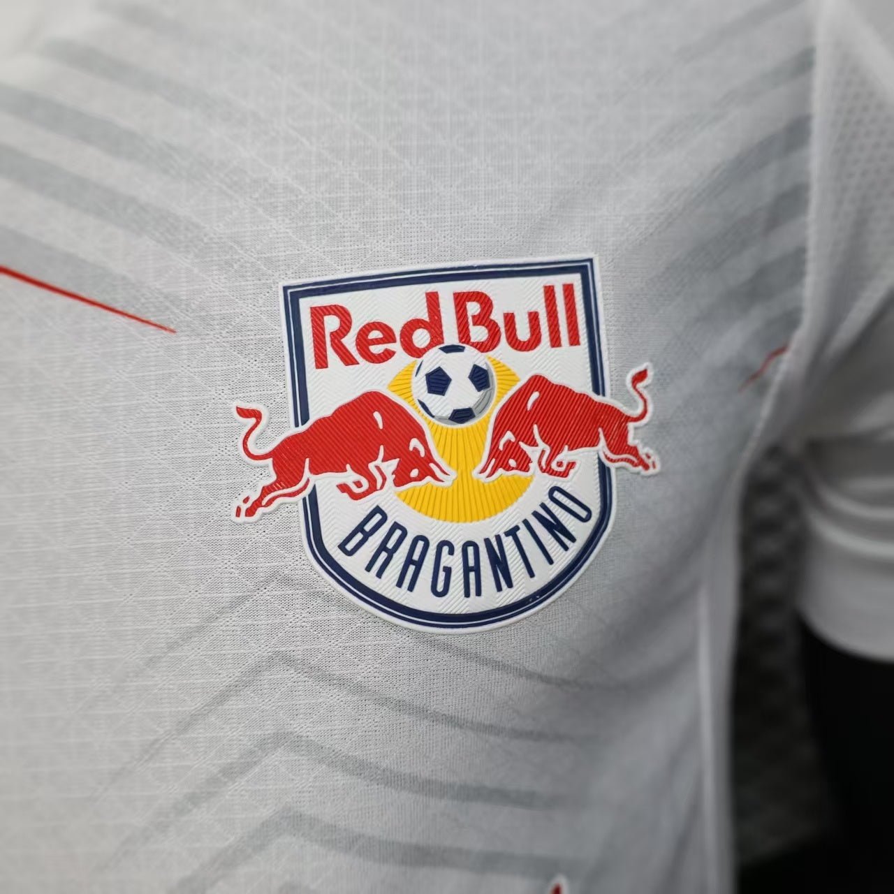 2025/26 RB Leipzig Home Player Version Jersey - White Red Geometric Arrow Chevron Pattern - Red Bull Double Bull Yellow Sun Crest