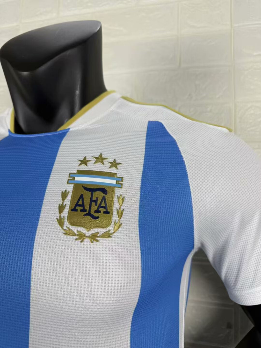 2025/26 Argentina Home Player Version Jersey - White Body Wide Sky Blue Central Vertical Stripe Fine Grid Texture Three Gold Stars Gold Collar Trim - Gold Three Stripes - AFA Square Crest