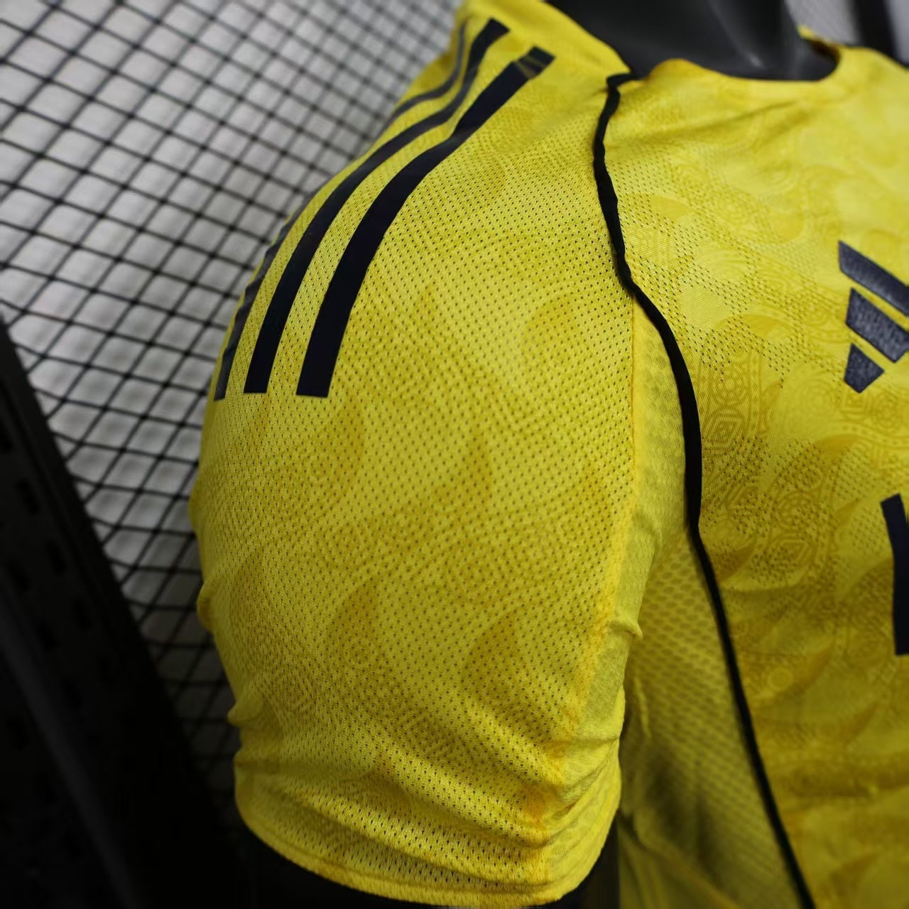 2025/26 Al-Riyadh Victory Home Player Version Jersey - Bright Yellow Body All-Over Diamond Embossed Texture - Black Side Seam Piping - Al-Riyadh Victory Crest - KAFD Principal Sponsor
