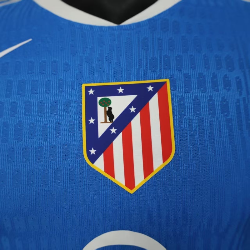 2025/26 Atlético de Madrid Second Away Player Version Jersey- Blue Body - White Trim V-Neck Collar - Red Shoulder Accent - White Nike Swoosh - Atlético Crest - Riyadh Air White Sponsor