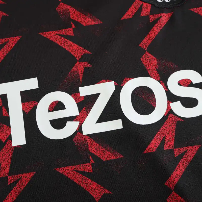 Manchester United Training Shirt Fan Version 2024/25 – Black Red Diamond Pattern Tezos Pre-Match Top