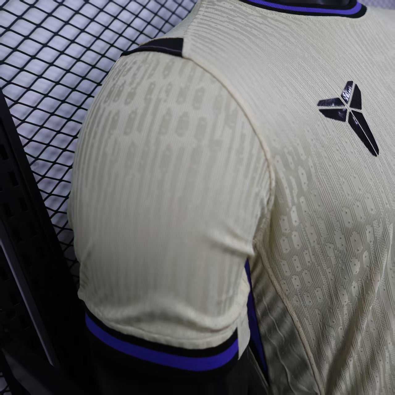 2025/26 FC Barcelona Away Player Version Jersey - Dri-FIT ADV - Champagne Off-White Body - Purple Crew Neck Collar - Black Shoulder Panels - Black FCB Crest - Spotify Black Sponsor
