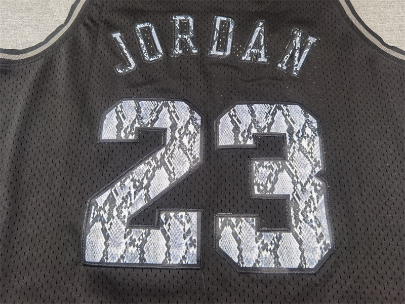 Michael Jordan #23 Chicago Bulls Mitchell & Ness Black Snakeskin Texture 1997-98 Hardwood Classics Authentic Jersey