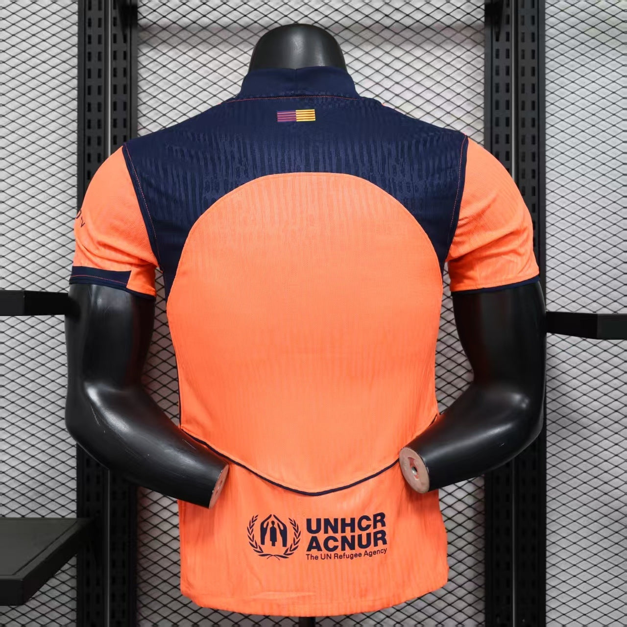 2025/26 FC Barcelona Away Player Version Jersey - Orange Body - Dri-FIT ADV - Navy Blue Crew Neck - Navy Blue Sleeve Cuffs & Side Seam Piping - Navy Blue Nike Swoosh - FCB Orange Monochrome Crest - Spotify Navy Blue Sponsor