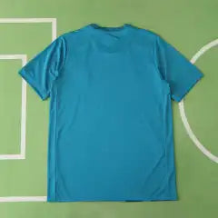 Real Madrid CF Third Retro Fan Version Jersey 2017/18 – Teal Football Shirt with Navy Pixel Block Design