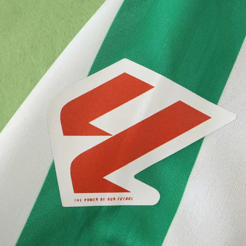 Real Betis Balompié Home Fan Version 2024/25 X Edition – Green & White Vertical Stripe La Liga Football Jersey | Gold Crest