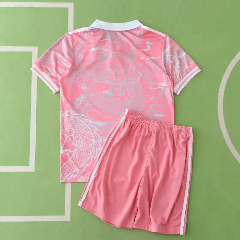 Real Madrid CF Concept Kids Kit 2024/25 – Pink Camo Children's Football Jersey & Shorts Set