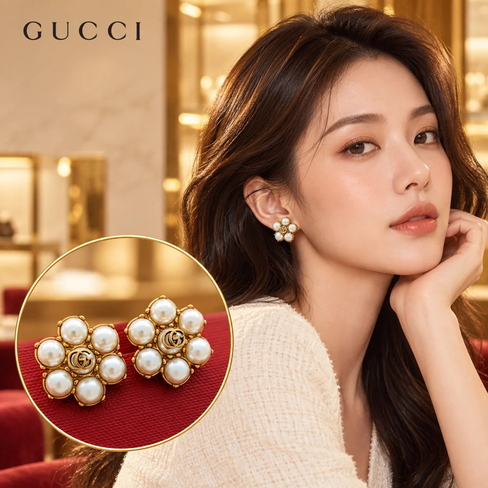 Gucci Floral Gold-Tone Stud Earrings - image 1