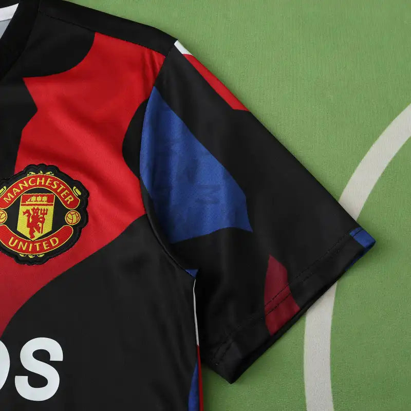 Manchester United Training Shirt Fan Version 2024/25 – Black Red Blue Geometric Tezos Pre-Match Top