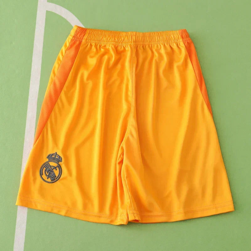 Real Madrid CF Away Kids Kit 2024/25 – Orange & Black Adidas Children's Football Jersey | Mbappé Bellingham Vini Jr. Youth La Liga Kit