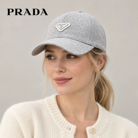 Prada baseball cap worn by an adult female model