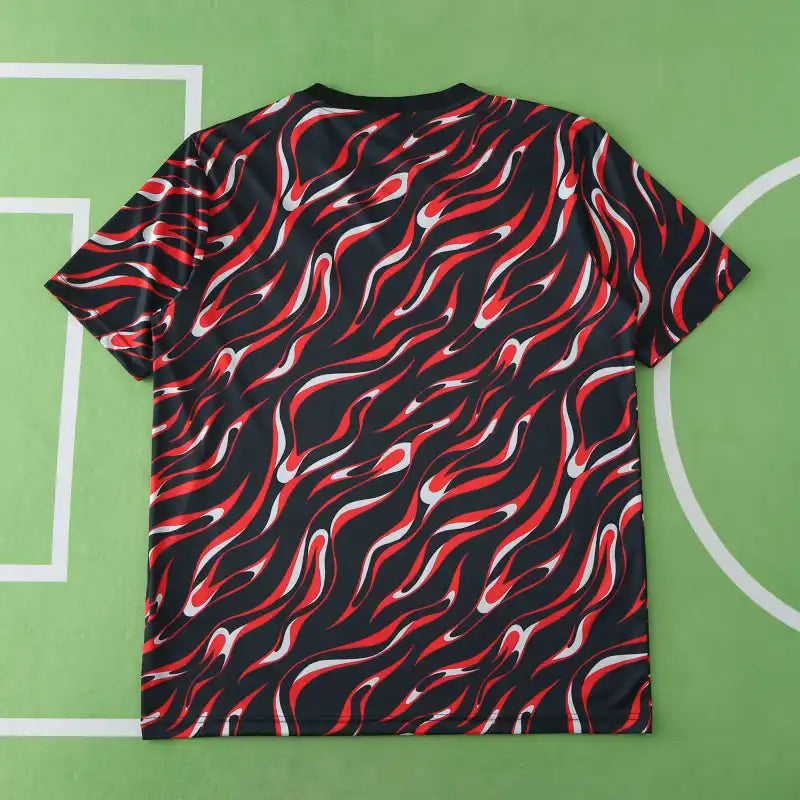 Manchester United Training Shirt Fan Version 2025/26 – Black Red Flame Print Pre-Match Top