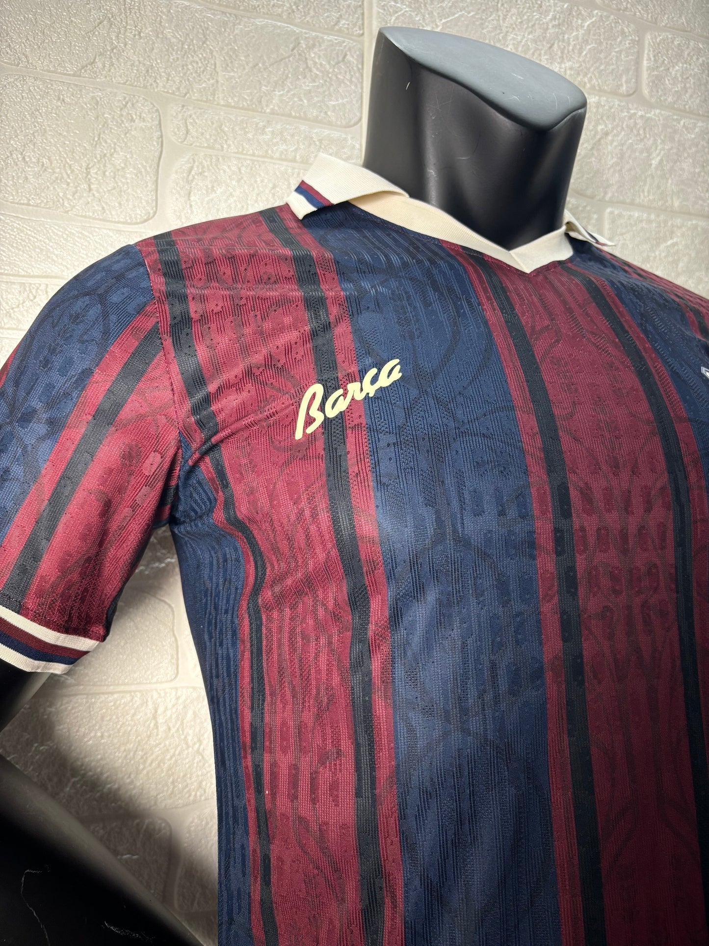 2025/26 FC Barcelona 125th Anniversary Edition Player Version Jersey - Dark Navy Blue & Deep Red Vertical Stripe - White V-Neck Collar - Gold Barça Script - Vintage FCB Crest - Clean Chest