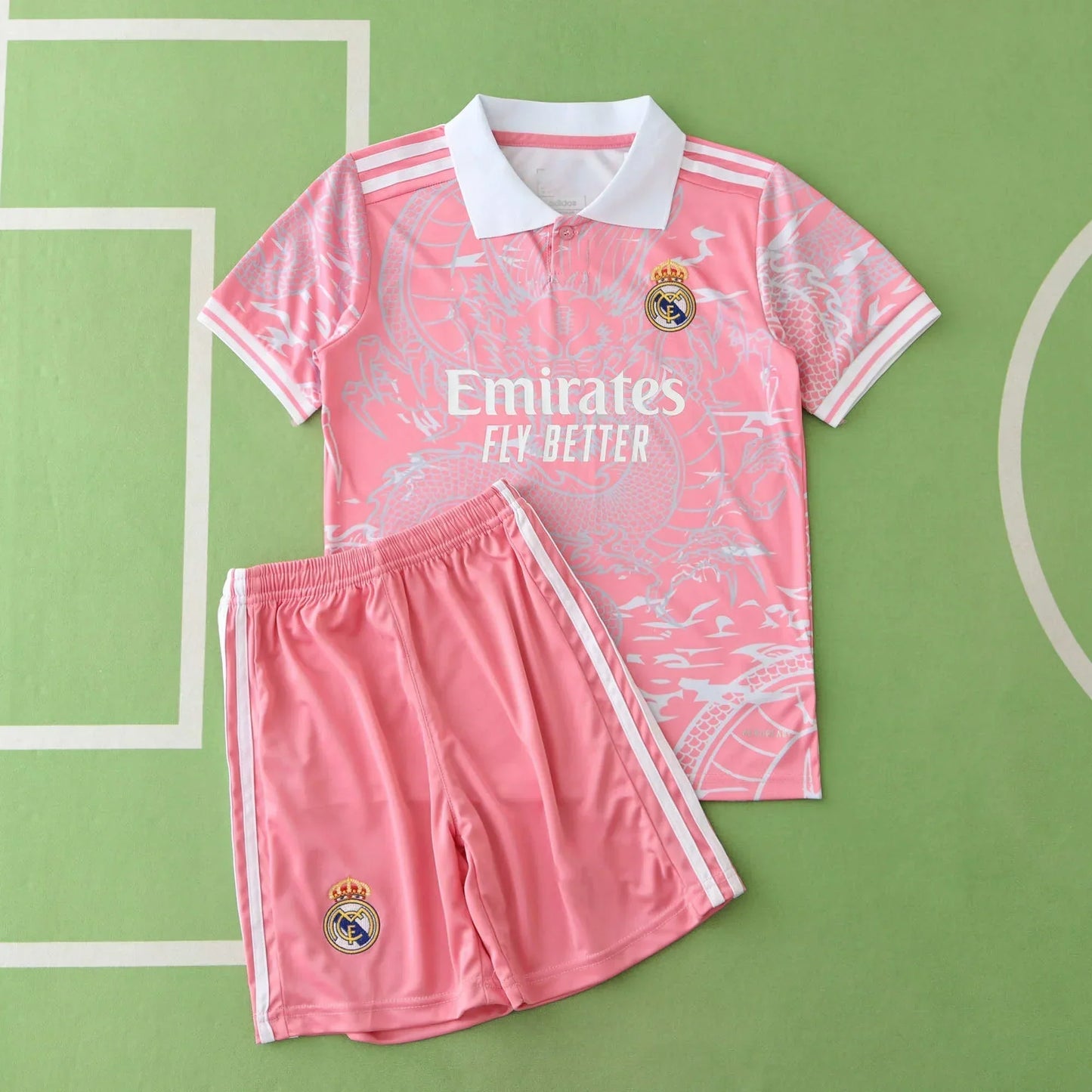 Real Madrid CF Concept Kids Kit 2024/25 – Pink Camo Children's Football Jersey & Shorts Set