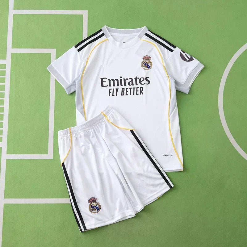 Real Madrid CF Home Kids Kit 2025/26 – White Football Jersey & Shorts Set with Gold Trim