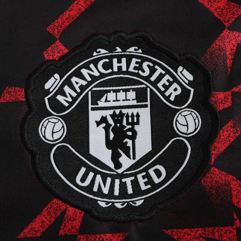 Manchester United Training Shirt Fan Version 2024/25 – Black Red Diamond Pattern Tezos Pre-Match Top