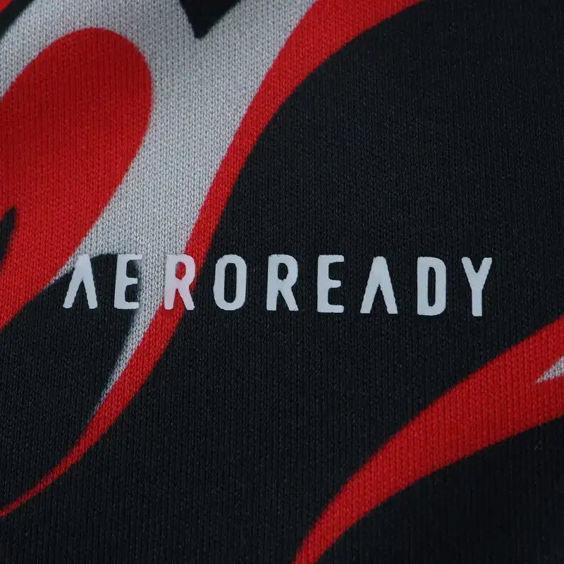 Manchester United Training Shirt Fan Version 2025/26 – Black Red Flame Print Pre-Match Top