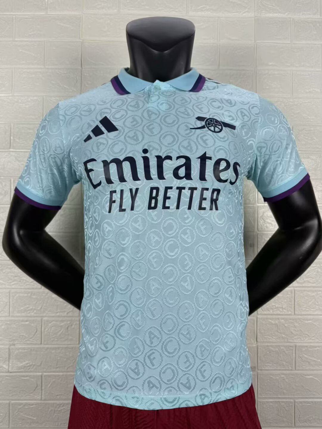 2025/26 Arsenal Special Edition Player Version Jersey - Ice Blue Body All-Over Tonal Cannon Circular Emboss Pattern Deep Purple Polo Collar Deep Purple Sleeve Cuff Trim - Dark Navy Three Stripes - Dark Navy Arsenal Cannon Crest - Emirates Fly Better