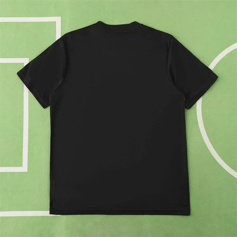 Manchester United Year of the Snake Limited Edition Training Shirt Fan Version 2024/25 – Black Gold Tezos Pre-Match Top