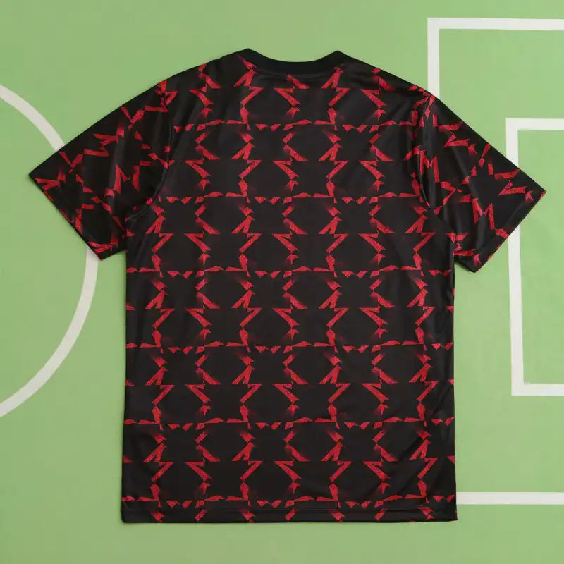 Manchester United Training Shirt Fan Version 2024/25 – Black Red Diamond Pattern Tezos Pre-Match Top