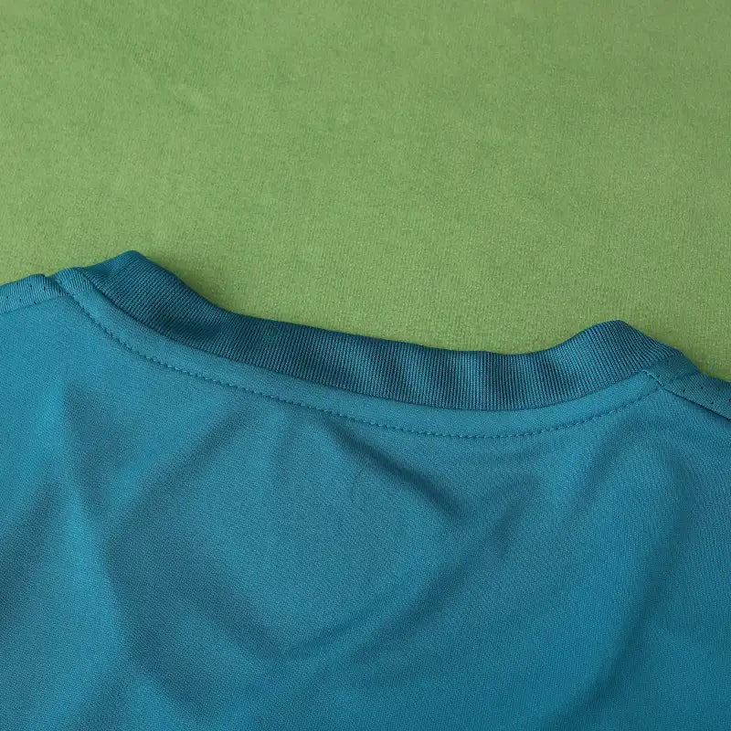 Real Madrid CF Third Retro Fan Version Jersey 2017/18 – Teal Football Shirt with Navy Pixel Block Design