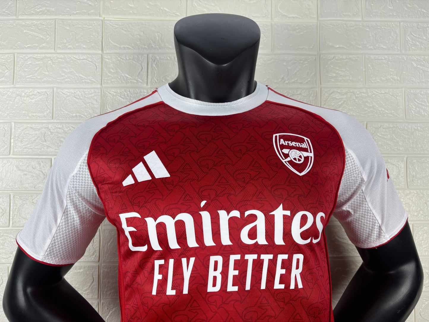 2025/26 Arsenal Home Player Version Jersey - Red Body White Sleeves Diamond Mesh Texture Red Side Seam Piping - White Three Stripes Left Chest - Arsenal Shield Crest Right Chest - Emirates Fly Better Principal Sponsor