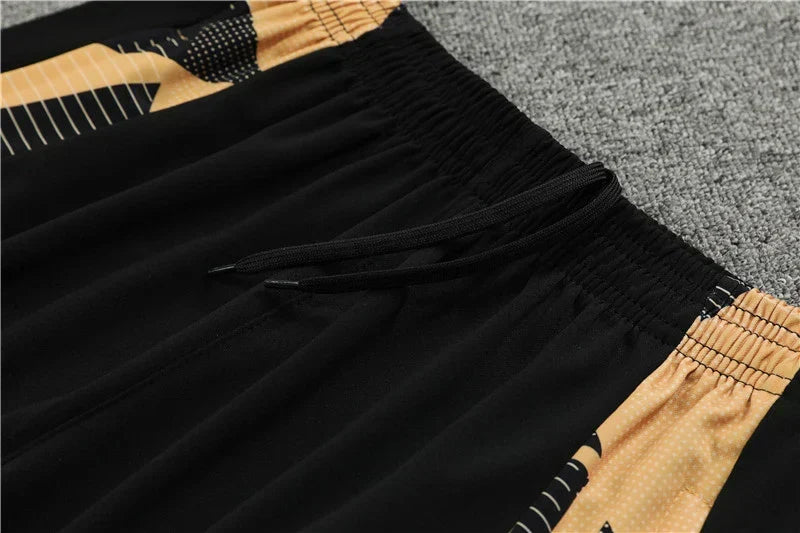 Real Madrid 2024/25 Black & Gold Adidas Training Tracksuit – Quarter-Zip Top & Tapered Pants | Emirates La Liga Training Suit