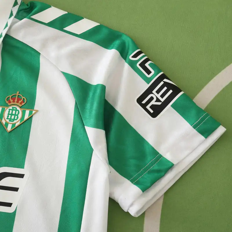 Real Betis Balompié Home Fan Version 2024/25 X Edition – Green & White Vertical Stripe La Liga Football Jersey | Gold Crest