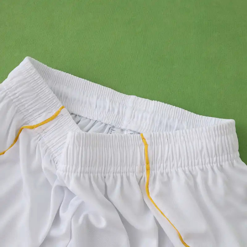 Real Madrid CF Home Football Shorts 2025/26 – White Matchday Shorts with Black Stripes & Gold Trim