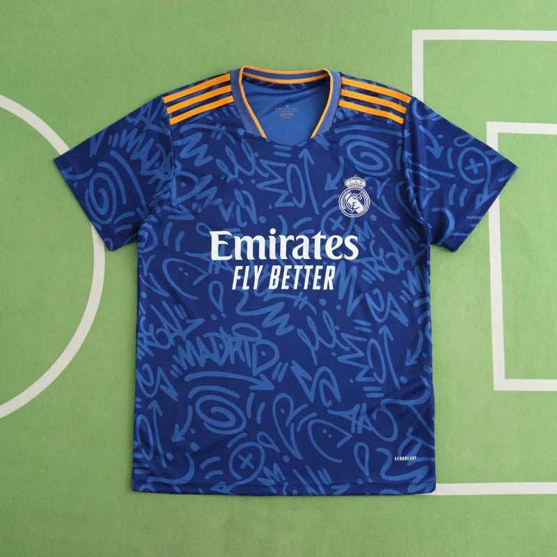 Real Madrid CF Away Fan Version 2021/22 – Blue Graffiti Street Art All-Over Print Adidas Football Jersey | Orange Stripe La Liga Shirt