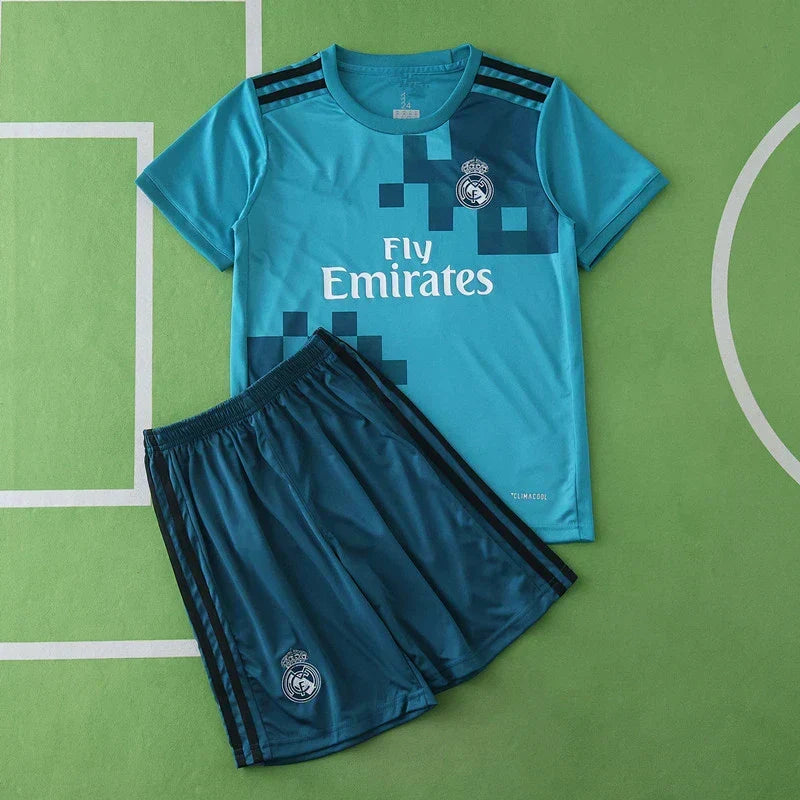 Real Madrid CF Third Retro Kids Kit 2017/18 – Children's Teal Football Jersey & Shorts Set with Pixel Block Design