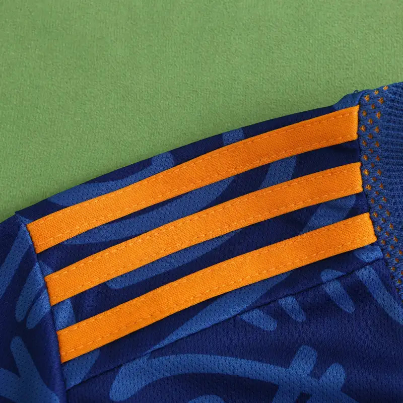 Real Madrid CF Away Fan Version 2021/22 – Blue Graffiti Street Art All-Over Print Adidas Football Jersey | Orange Stripe La Liga Shirt