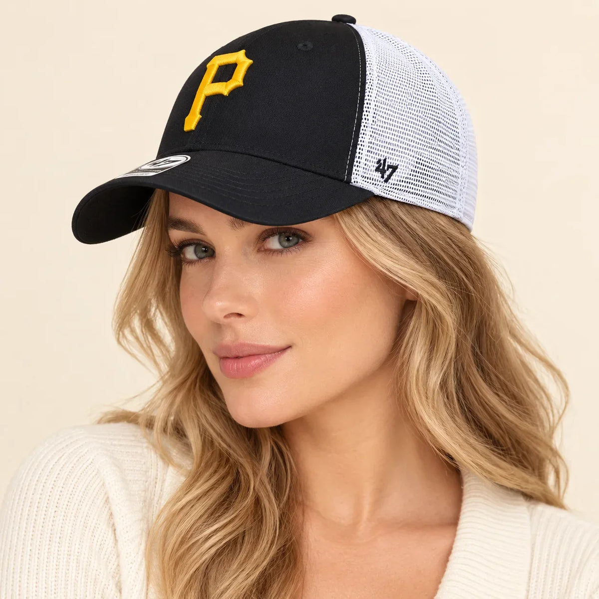 Model wearing baseball cap on head