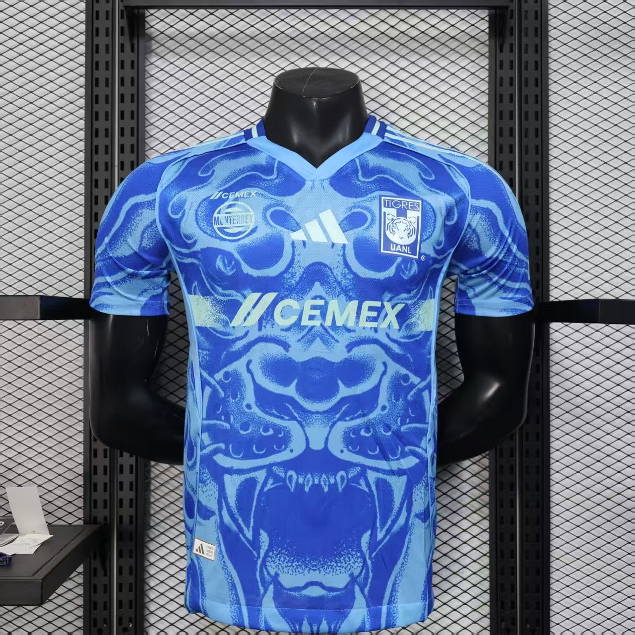 2025/26 Tigres UANL Away Player Version Jersey - Royal Blue Body - All-Over Tiger Face Tonal Graphic Print - Blue V-Neck Collar - CEMEX White Sponsor