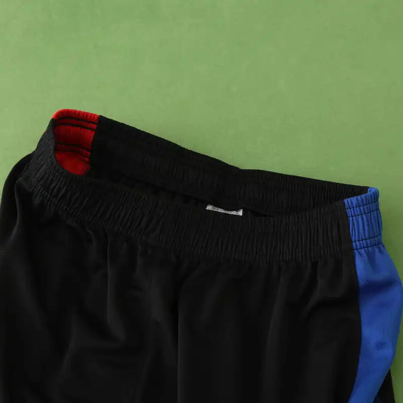 FC Barcelona Away Shorts 2024/25 — Black with Red & Blue Side Stripes