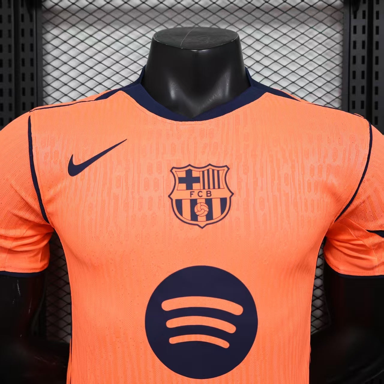 2025/26 FC Barcelona Away Player Version Jersey - Orange Body - Dri-FIT ADV - Navy Blue Crew Neck - Navy Blue Sleeve Cuffs & Side Seam Piping - Navy Blue Nike Swoosh - FCB Orange Monochrome Crest - Spotify Navy Blue Sponsor