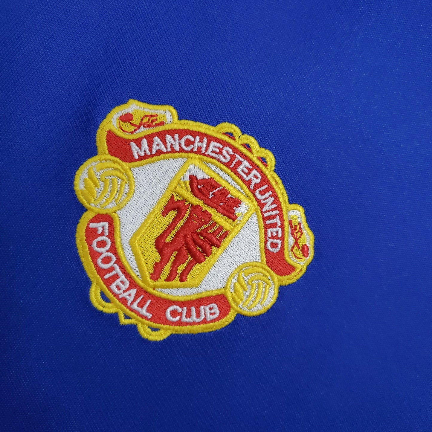 Manchester United 1985-86 Away Retro Jersey – Adidas Royal Blue Sharp V-Neck Trefoil Classic 80s Fan Version Football Shirt