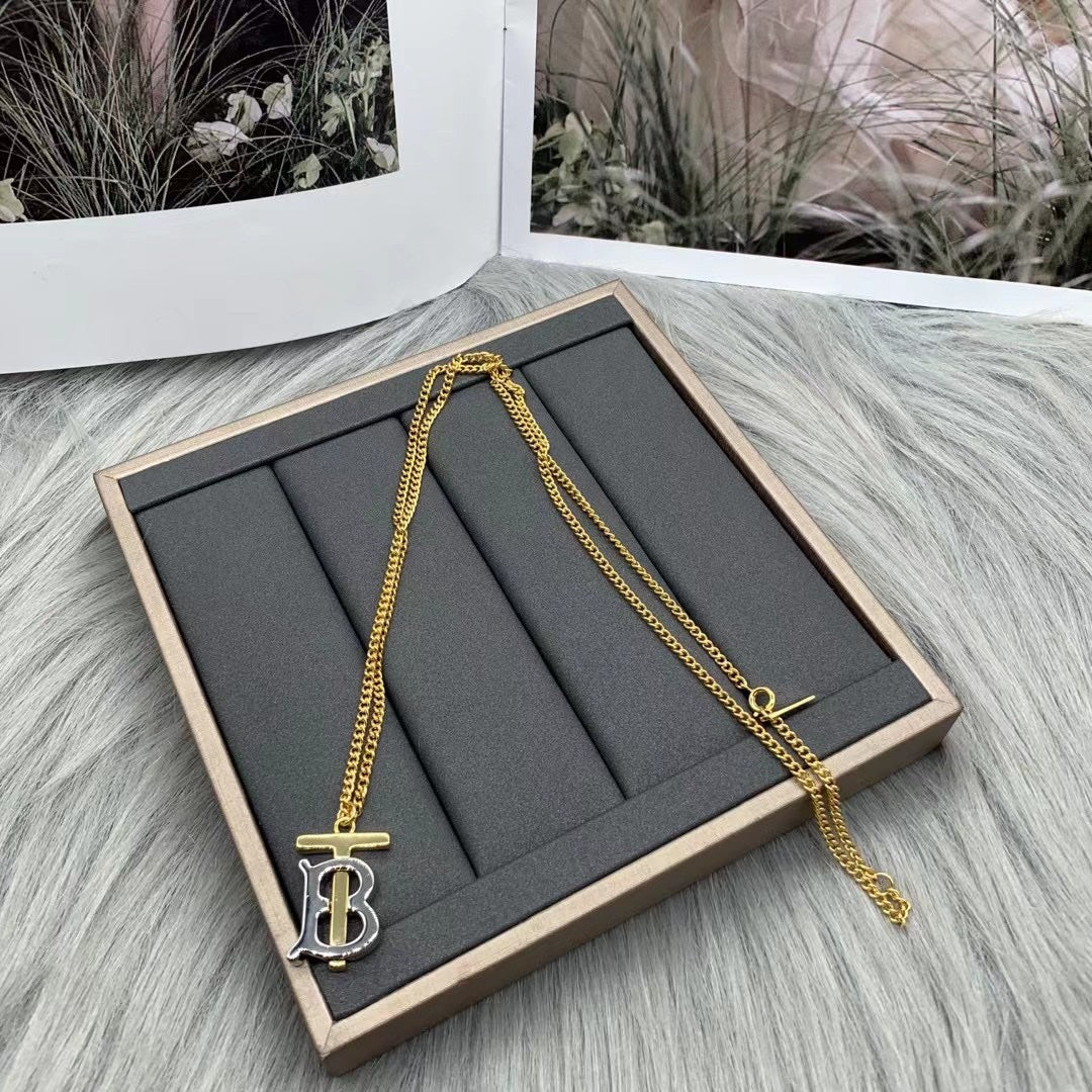 Burberry TB monogram pendant necklace in Gold Tone, detail view 2