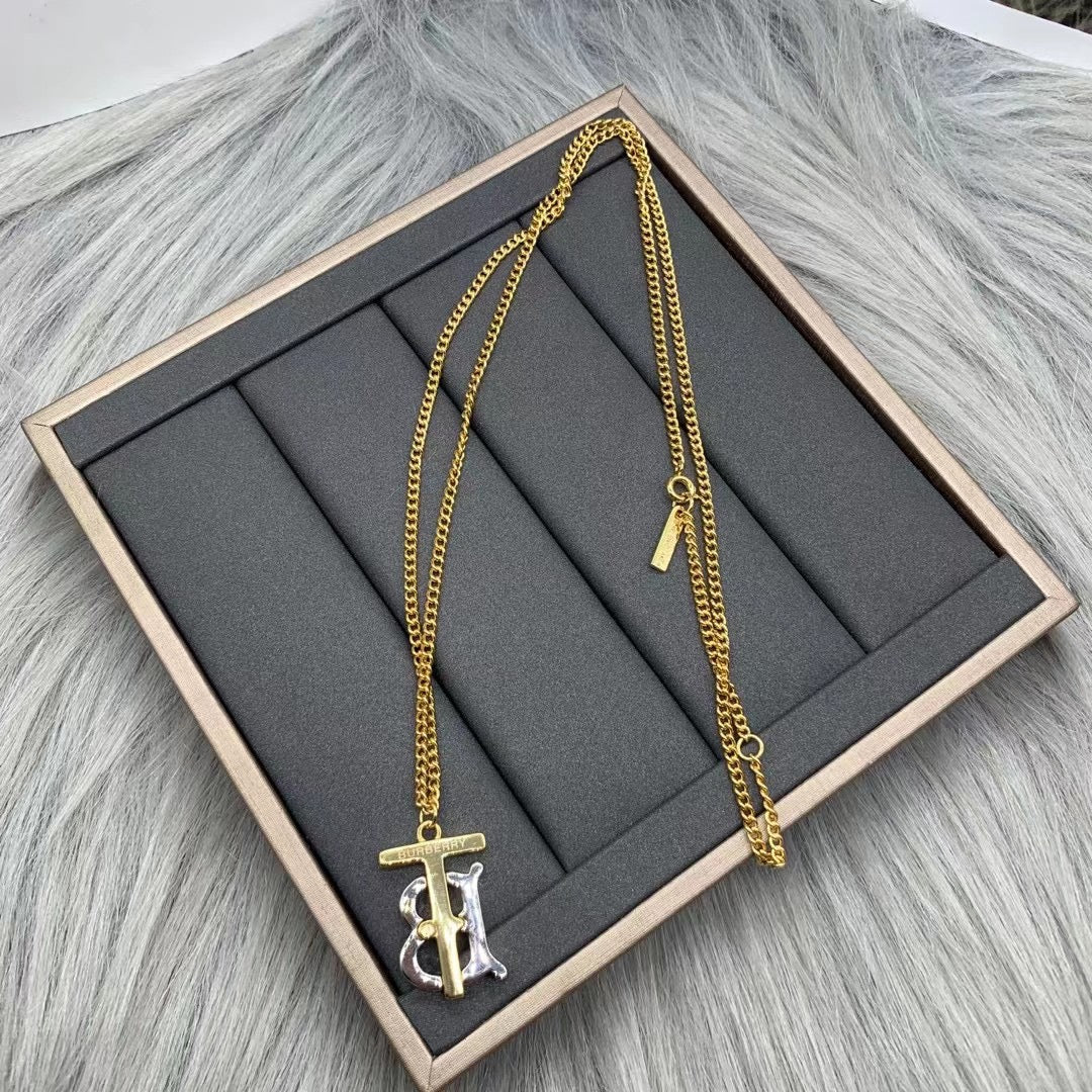 Burberry TB monogram pendant necklace in Gold Tone, main view
