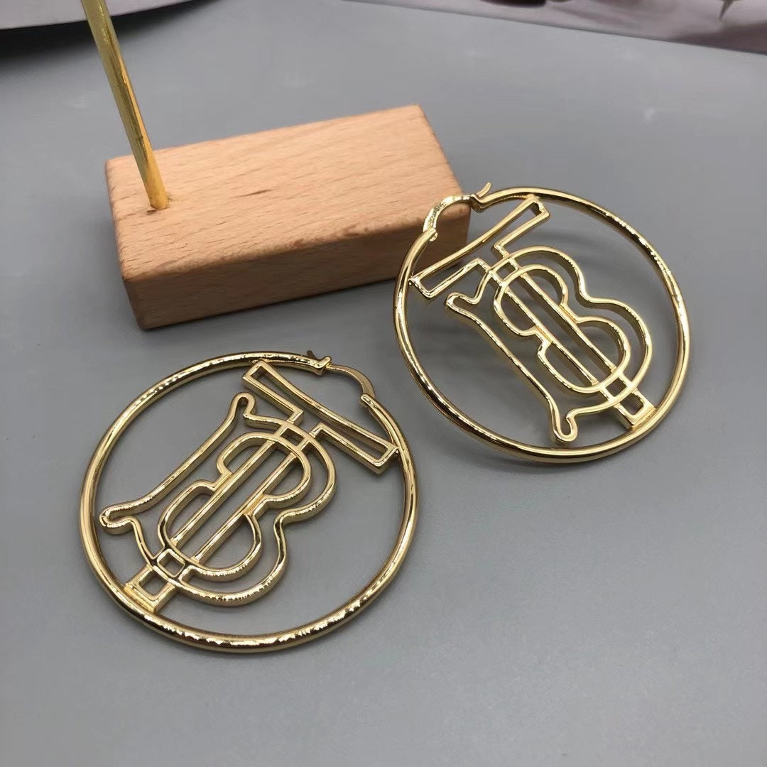 Burberry oval TB monogram drop earrings in Gold Tone, detail view 3