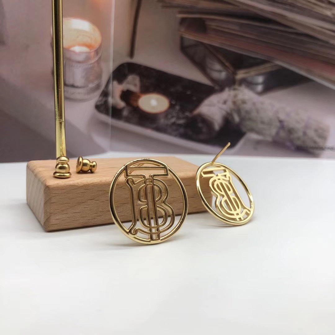 Burberry round crystal TB monogram stud earrings in Gold Tone, detail view 2