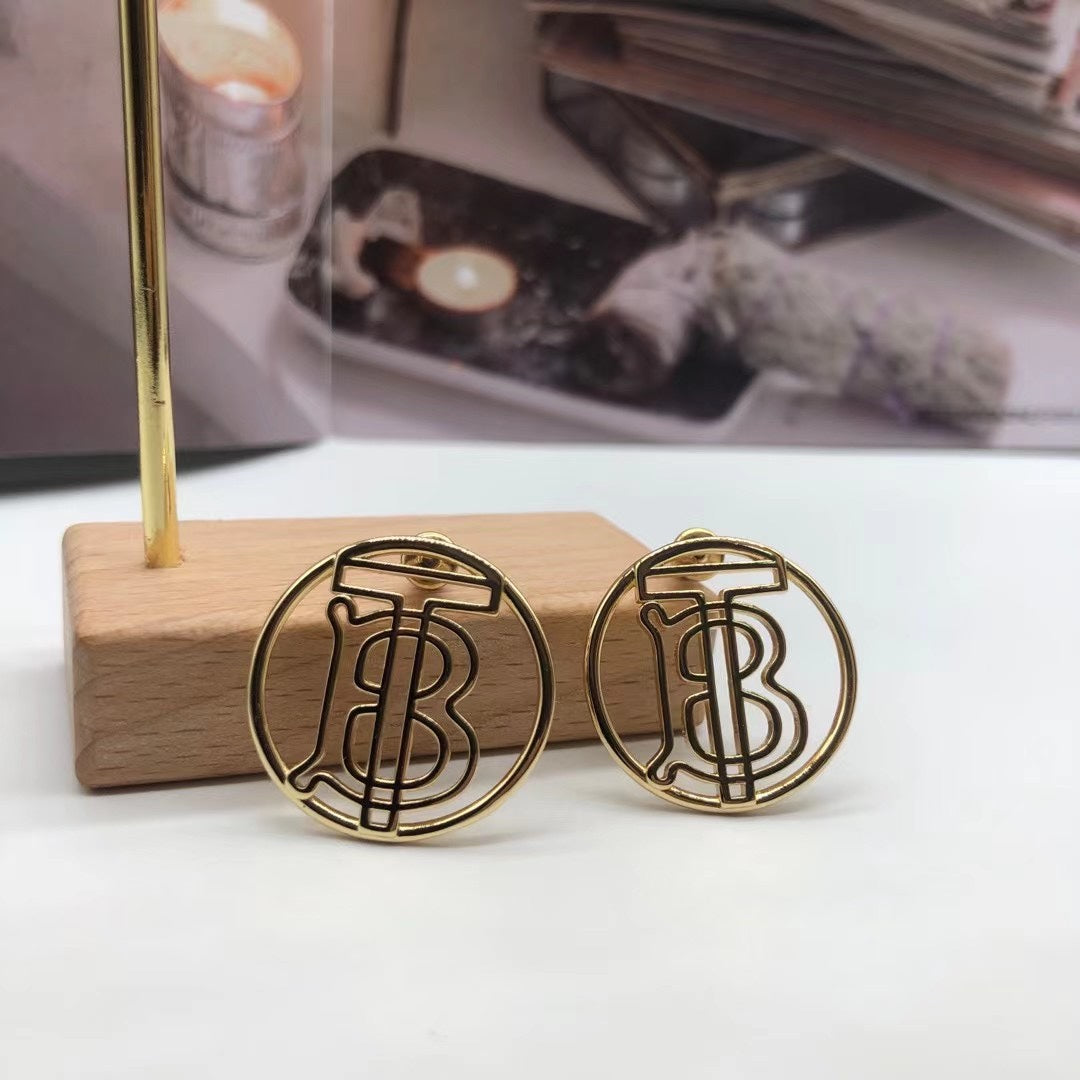 Burberry round crystal TB monogram stud earrings in Gold Tone, main view