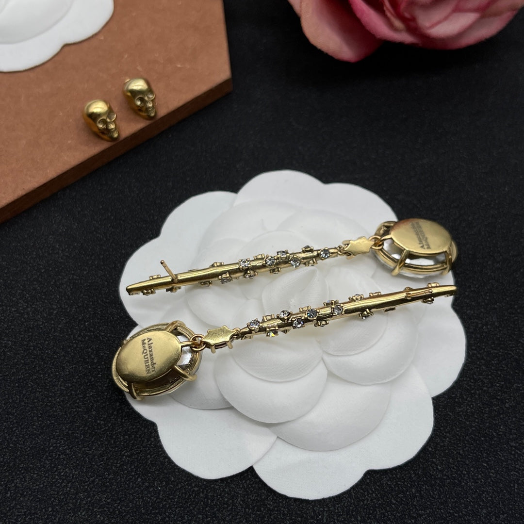 Alexander McQueen Crystal Pin Drop earrings in Gold Tone, detail view 6