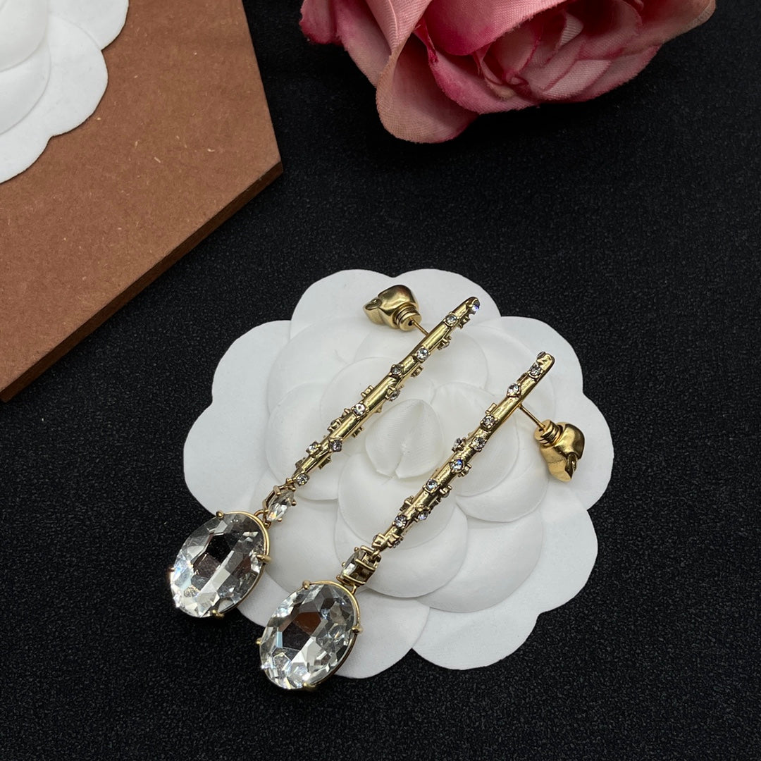 Alexander McQueen Crystal Pin Drop earrings in Gold Tone, detail view 3