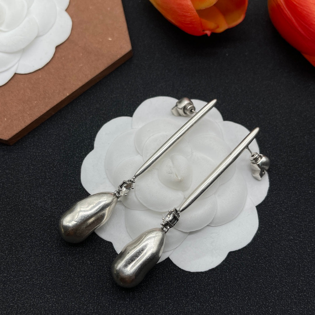 Alexander McQueen Sculpted Pin Drop earrings in Silver Tone, main view