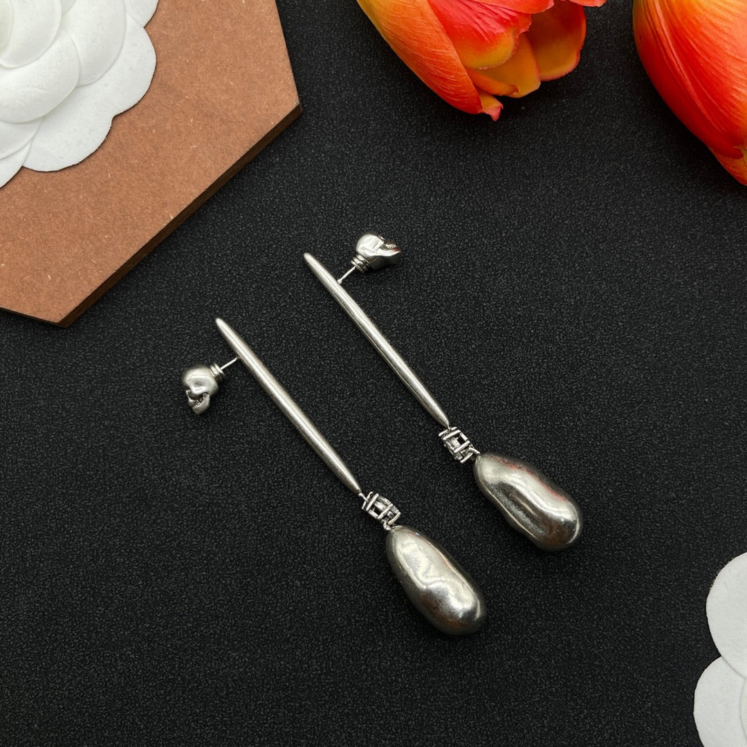Alexander McQueen Sculpted Pin Drop earrings in Silver Tone, detail view 2